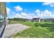 Spacious backyard with lush green grass, patio, and privacy fence; ideal for outdoor activities at 4420 Bright Rd, Charlotte, NC 28214
