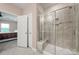 Bathroom with glass shower, tile surround and a built-in seat at 4420 Bright Rd, Charlotte, NC 28214