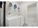 Well-equipped laundry room with modern appliances and ample storage space at 4420 Bright Rd, Charlotte, NC 28214