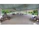 Community pavilion featuring picnic tables, lighting, and concrete patio for outdoor gatherings at 4420 Bright Rd, Charlotte, NC 28214