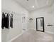 Walk-in closet with wire shelving and a mirror at 4420 Bright Rd, Charlotte, NC 28214