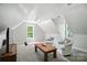 Bonus room featuring natural light and two armchairs at 4605 Sarandon Ct, Charlotte, NC 28215