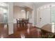 Elegant dining room with hardwood floors, archways, and plenty of space for entertaining at 4605 Sarandon Ct, Charlotte, NC 28215