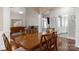Dining room adjacent to the living room is perfect for Gathering meals or hosting friends and Gathering at 4605 Sarandon Ct, Charlotte, NC 28215