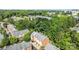 Aerial view of townhome complex surrounded by mature trees in a neighborhood setting at 4854 S Hill View Dr, Charlotte, NC 28210