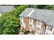 An aerial view of the townhome complex, showcasing the architecture and surrounding lush greenery at 4854 S Hill View Dr, Charlotte, NC 28210