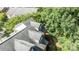 A close aerial shot of townhome roofs, highlighting the architectural details and surrounding greenery at 4854 S Hill View Dr, Charlotte, NC 28210