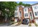 Charming brick townhome with a well-manicured lawn and convenient two-car garage at 4854 S Hill View Dr, Charlotte, NC 28210