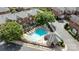 A community pool surrounded by lounge chairs, tables, and umbrellas offering a resort-like experience at 4854 S Hill View Dr, Charlotte, NC 28210