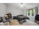 Inviting bedroom featuring a comfortable bed, a reading nook, and soft natural light at 4921 Sierra Dr, Maiden, NC 28650