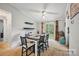 Cozy dining room with a ceiling fan, table and chairs and sliding glass doors at 4921 Sierra Dr, Maiden, NC 28650