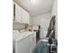 Functional laundry room with a washer, dryer, storage, and convenient access to the outside at 4921 Sierra Dr, Maiden, NC 28650