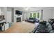 Spacious living room with fireplace, large window and comfortable seating at 4921 Sierra Dr, Maiden, NC 28650
