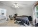 Bright bedroom featuring a ceiling fan, neutral walls, and natural light from the window at 4921 Sierra Dr, Maiden, NC 28650