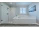 Stylish bathroom featuring a separate shower and tub with subway tile surround, and a modern vanity at 5256 Meadowcroft Way, Fort Mill, SC 29708