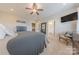 Comfortable bedroom with neutral carpet, ceiling fan, and en-suite bath, offering relaxation and privacy at 5256 Meadowcroft Way, Fort Mill, SC 29708