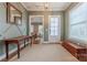 Inviting entryway showcasing elegant decor, natural light, and beautiful hardwood floors at 5256 Meadowcroft Way, Fort Mill, SC 29708