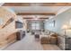 Cozy living room features wood beams, light green walls, and a large sectional at 5256 Meadowcroft Way, Fort Mill, SC 29708