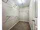 Organized closet features shelving and plenty of space for storage and organization of clothing and personal items at 5434 Starflower Dr, Charlotte, NC 28215