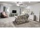 Comfortable living room with a ceiling fan and plush seating, creating an inviting atmosphere at 5434 Starflower Dr, Charlotte, NC 28215