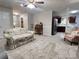 Open-concept living space showcasing a light-filled layout with view into the kitchen at 5434 Starflower Dr, Charlotte, NC 28215