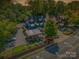 Aerial view of a commercial property featuring a restaurant, outdoor seating, and ample parking, a local destination at 622 Mattie Rose Ln, Charlotte, NC 28204