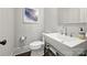 Clean and simple bathroom with a modern sink, faucet and fixtures, plus ample counter space at 622 Mattie Rose Ln, Charlotte, NC 28204