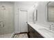Sleek bathroom with a glass shower, double sink vanity, and stylish lighting at 622 Mattie Rose Ln, Charlotte, NC 28204