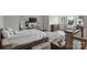 Spacious bedroom features a bed, sports memorabilia, and natural light from the window at 622 Mattie Rose Ln, Charlotte, NC 28204
