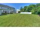 Expansive green backyard, perfect for outdoor activities and relaxation at 6873 Lakecrest Ct, Denver, NC 28037