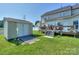 Spacious backyard featuring a deck for outdoor enjoyment and a storage shed at 6873 Lakecrest Ct, Denver, NC 28037