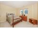 Comfortable bedroom with natural light, matching furnishings, and closet space at 6873 Lakecrest Ct, Denver, NC 28037