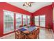 Dining room with large windows providing natural light and a ceiling fan at 6873 Lakecrest Ct, Denver, NC 28037