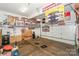 Spacious two-car garage with ample wall storage for tools, equipment, and car care items at 6873 Lakecrest Ct, Denver, NC 28037