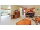 Open-concept living room leading to a pool table room and kitchen at 6873 Lakecrest Ct, Denver, NC 28037