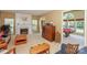 Bright living room with fireplace and views of the backyard at 6873 Lakecrest Ct, Denver, NC 28037