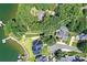 An aerial view shows the property's location and boundary lines of the lakefront home at 7010 Coventry Ct, Tega Cay, SC 29708
