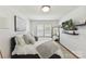 Bedroom featuring hardwood floors, ceiling fan, mirror and a TV at 7010 Coventry Ct, Tega Cay, SC 29708