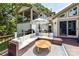 Expansive deck with cozy seating, offering shade with scenic backyard views and direct home access at 7010 Coventry Ct, Tega Cay, SC 29708