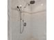 Modern shower featuring dual shower heads, marble tile surround, and mosaic tile accent at 7010 Coventry Ct, Tega Cay, SC 29708
