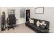 Bedroom featuring a sofa, desk, gaming chair, bookcase, carpet floors, and a window with blinds at 7109 N Mills Rd, Charlotte, NC 28216