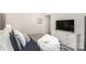 Comfortable bedroom with neutral decor and lots of natural light at 7109 N Mills Rd, Charlotte, NC 28216