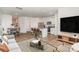 Open concept living space with a kitchen island, stainless appliances, and seating at 7109 N Mills Rd, Charlotte, NC 28216