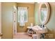 The bathroom has a pedestal sink, tile floors, and a window at 7612 Maple Bluff Ln, Concord, NC 28025