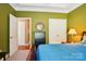 The bedroom has a closet, an attached bath and carpet at 7612 Maple Bluff Ln, Concord, NC 28025