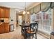 Charming breakfast nook with bright light, adjacent to kitchen, and complete with cozy round table at 7612 Maple Bluff Ln, Concord, NC 28025