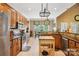 Spacious kitchen featuring modern appliances, granite countertops, a movable island, and plenty of storage at 7612 Maple Bluff Ln, Concord, NC 28025