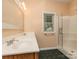 Bathroom featuring double sink vanity and glass-enclosed shower at 908 Haddonfield Dr, Fort Mill, SC 29708
