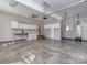 Spacious garage featuring concrete floors, ample storage, and a utility sink area at 908 Haddonfield Dr, Fort Mill, SC 29708