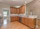 Well-appointed kitchen with wooden cabinets, granite countertops, and stainless steel appliances at 908 Haddonfield Dr, Fort Mill, SC 29708